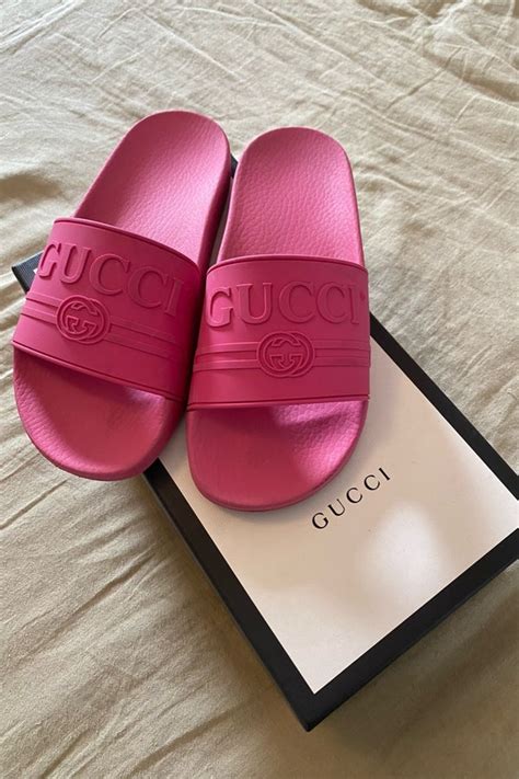 hot pink Gucci slides